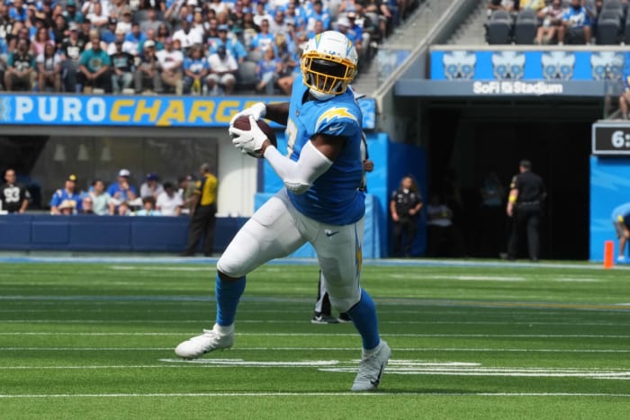 Sep 25, 2022; Inglewood, California, USA; Los Angeles Chargers tight end Gerald Everett (7) carries the ball against the Jacksonville Jaguars in the first half at SoFi Stadium. Mandatory Credit: Kirby Lee-USA TODAY Sports